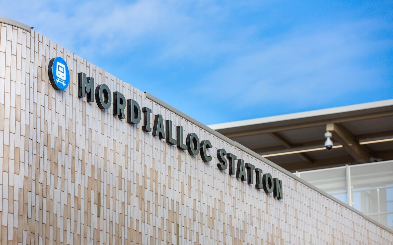 The new Mordialloc Station sign with Warm Neutral and Pale Eucalypt tiling